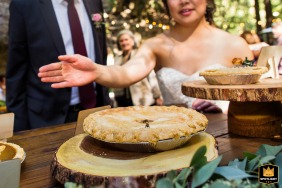 Bride Fearlessly Fights Bees for Pie in Saratoga Springs Wedding Photo A wedding picture captured the bride gracefully battling bees for her sweet pie at Saratoga Springs in Saratoga, CA.